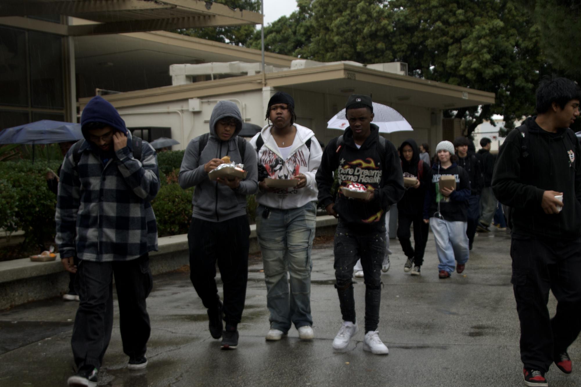 Students and faculty at Van Nuys High School find ways to embrace rainy weather, showcasing resilience and creativity during unexpected showers. Their adaptability highlights a vibrant community spirit.
