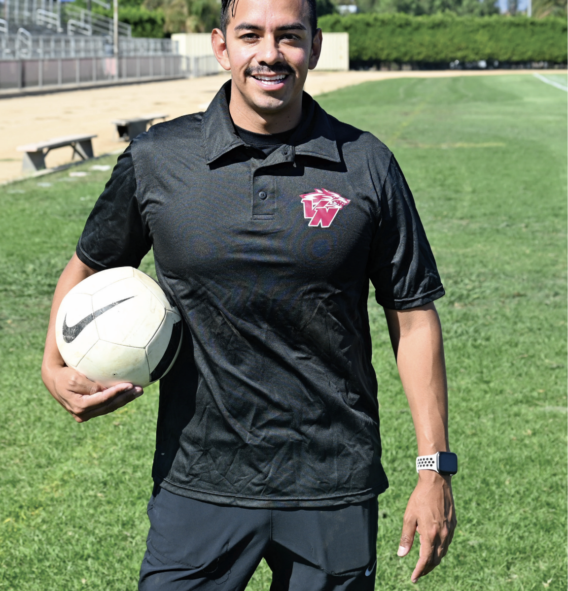  HARD AT WORK  Coach Joao Lopez, the new girls soccer coach, has his team hard at work, beginning daily practice at 7 a.m.