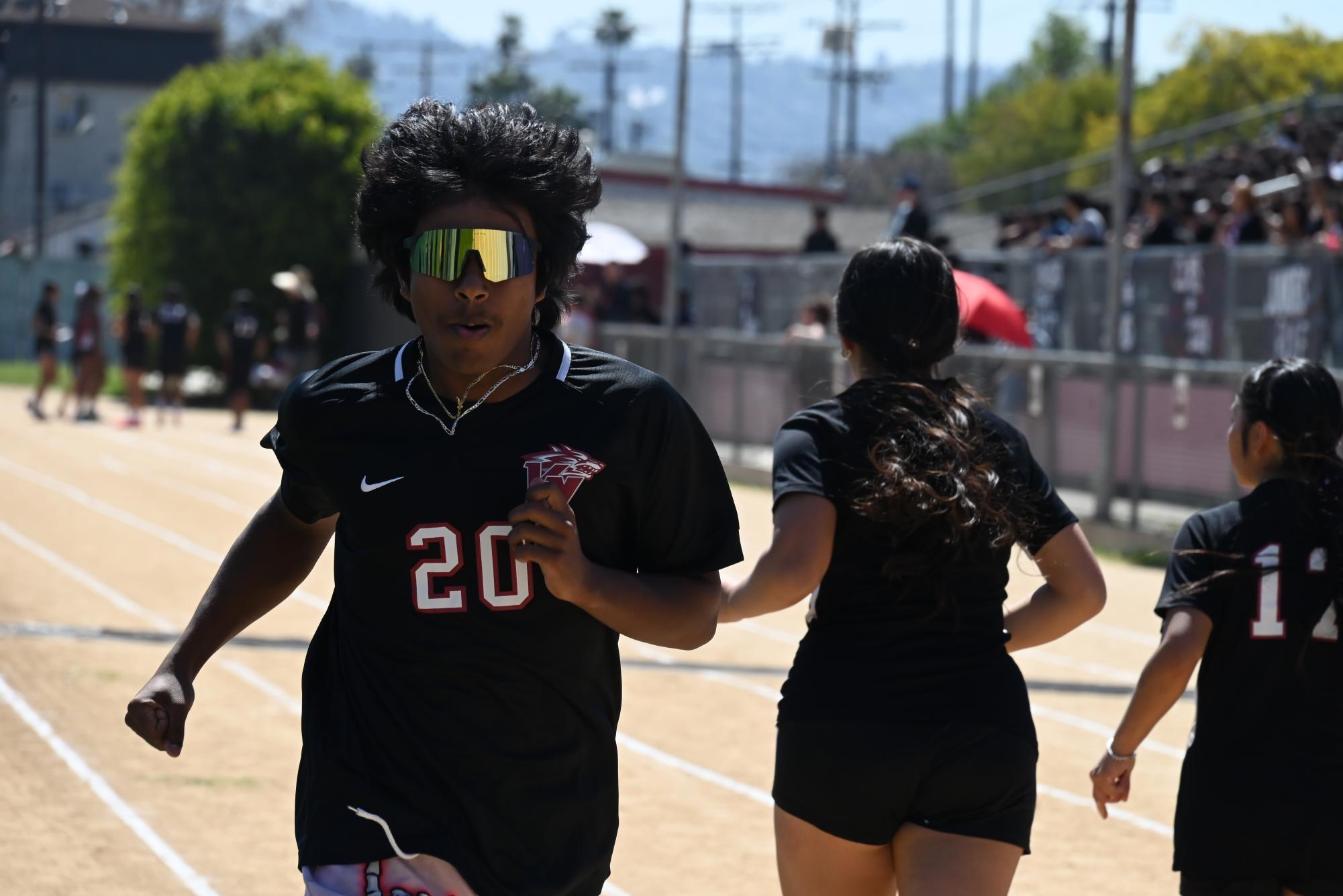 Athletic teams joined dance and cheer performers for an hour-long celebration featuring student competitions and team introductions, culminating in senior class spirit honors.