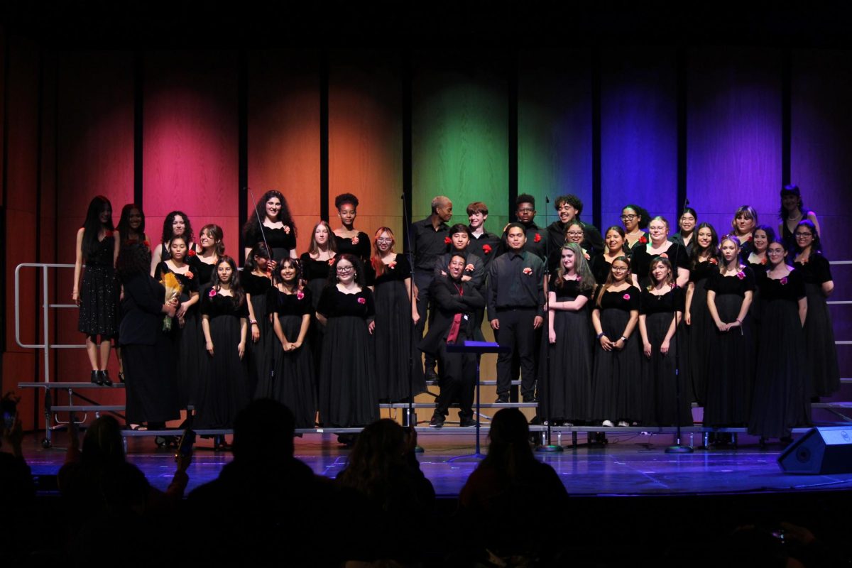 The choirs take their final bow after performing "Lovely Day."