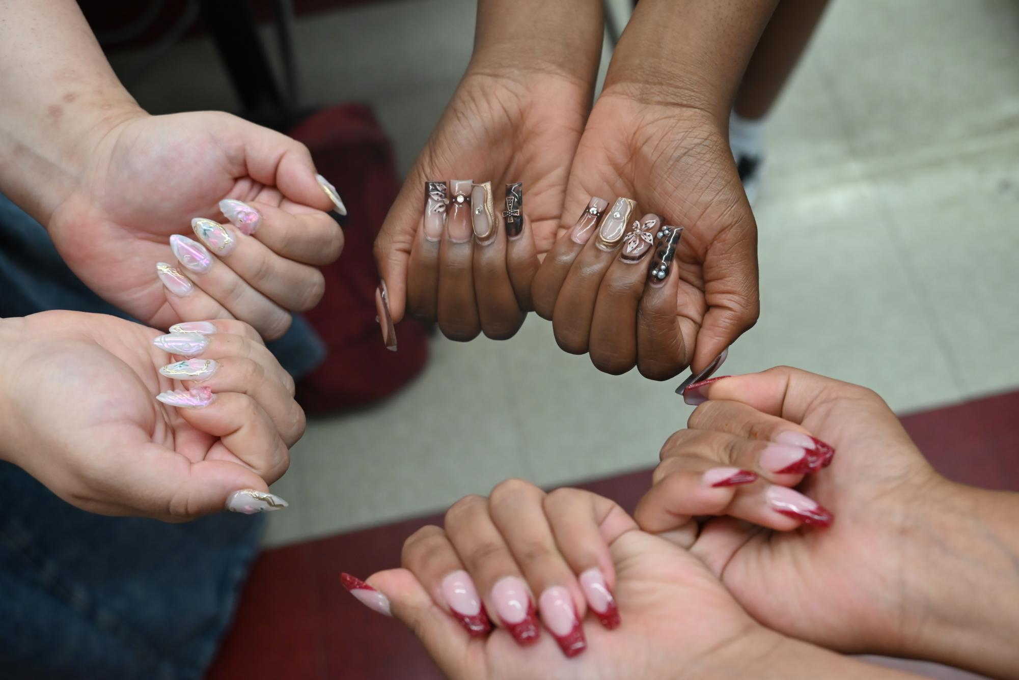 At this year's prom, the wolves displayed their creativity through vibrant and artistic nail designs, showcasing a variety of colors and styles that captivated attendees.