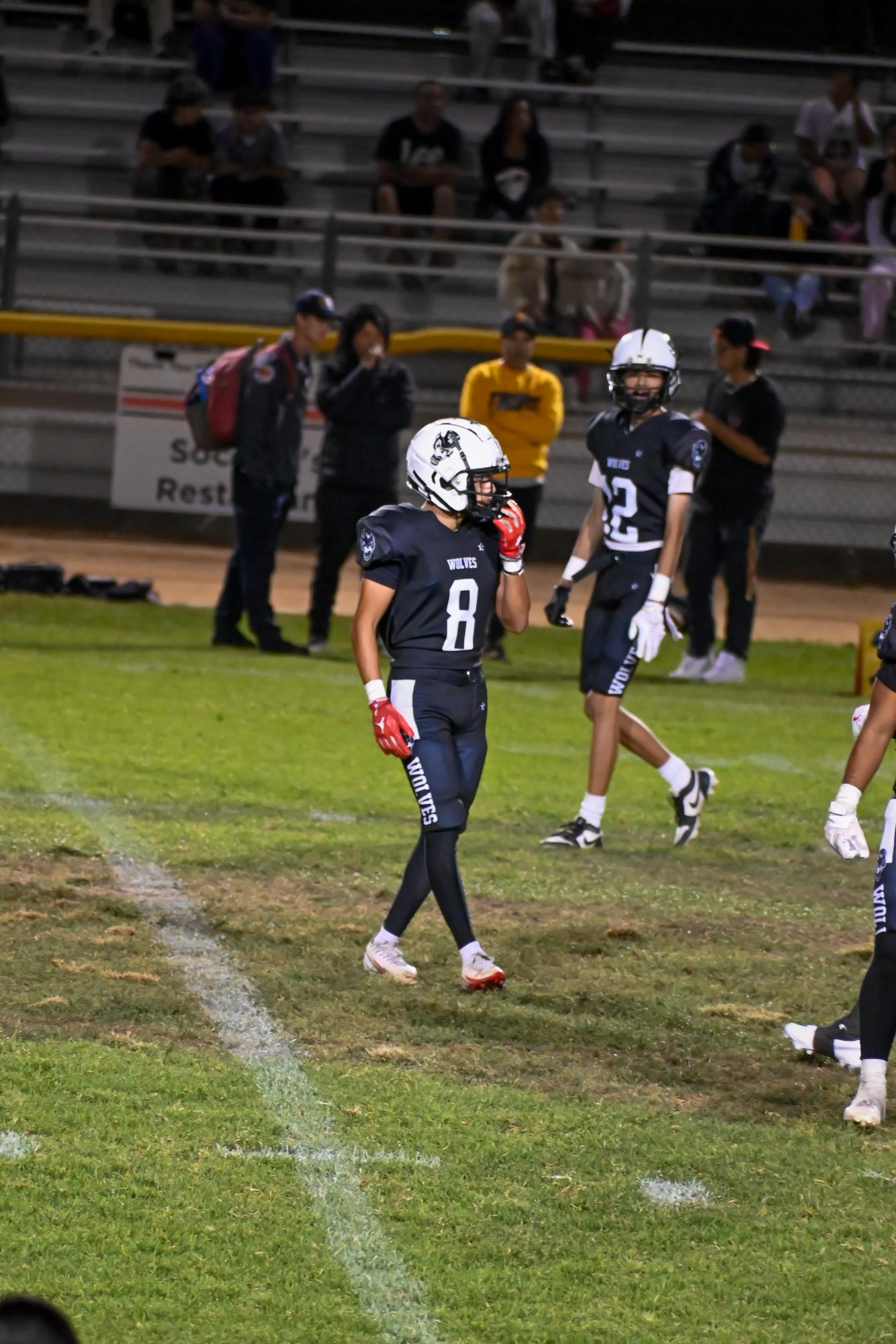 The Wolves football team defeated the San Fernando Tigers 32-6 at a home game, led by quarterback Carlos Herrera with three rushing touchdowns and standout plays.