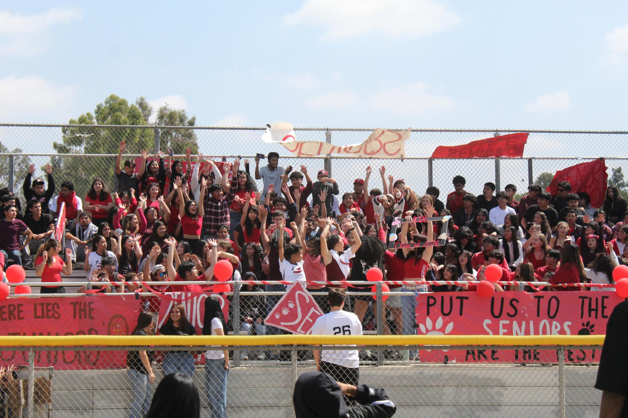 Van Nuys High School seniors participated in a crowd wave at the bleachers for a pep rally event. THE MIRROR | KIMBERLY SALAZAR