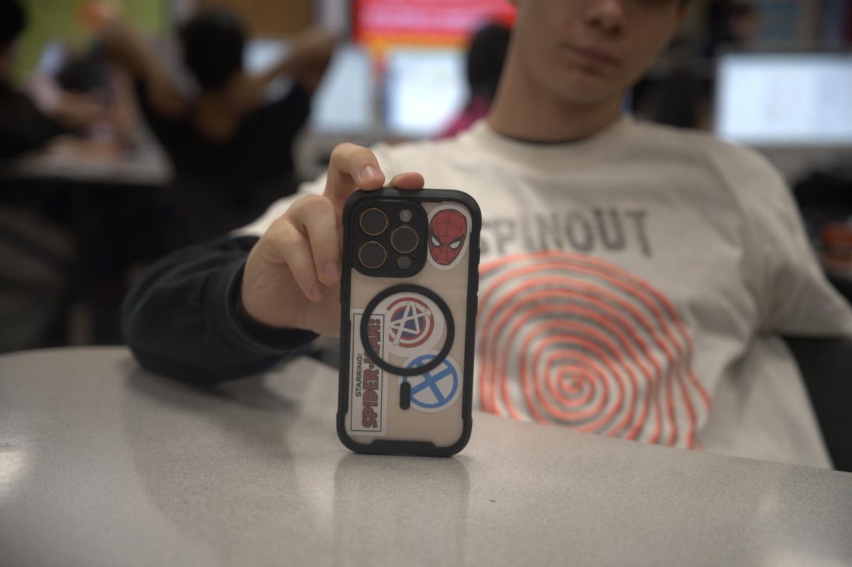 PHOTO STORY: Students show off their phone cases in class