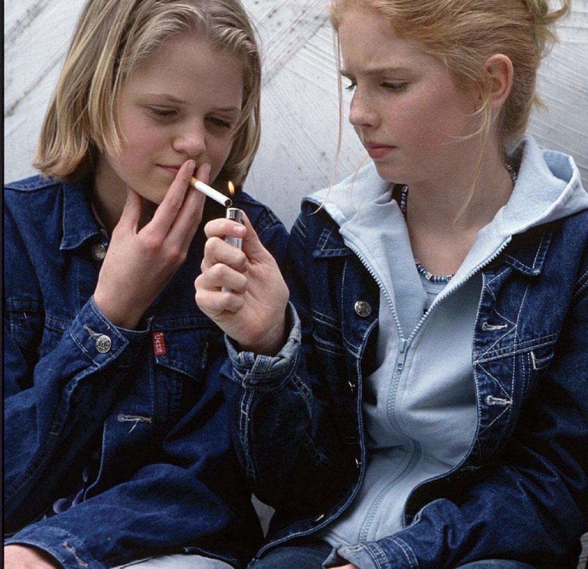 Teens lighting cigarette and putting themselves at risk for future harm 
Instagram | @image_magazine_news 