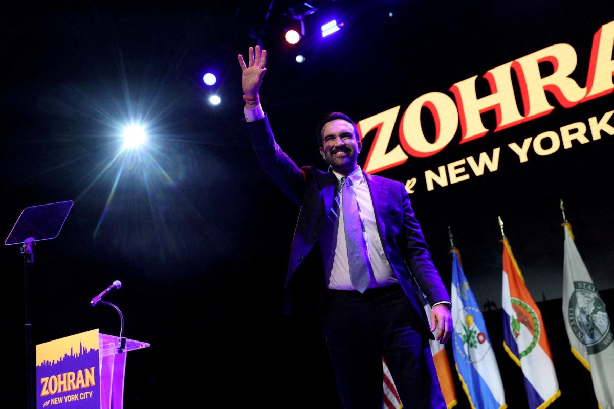 Democratic candidate for New York City mayor Zohran Mamdani waves on stage after winning the 2025 New York City Mayoral race, at an election night rally in the Brooklyn borough of New York City, New York, U.S., November 4, 2025.  REUTERS/Shannon Stapleton