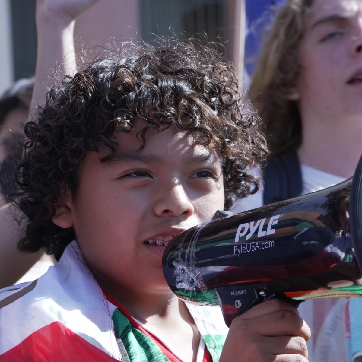  Tiny but Might  Young student from Robert Fulton leads protest chant.