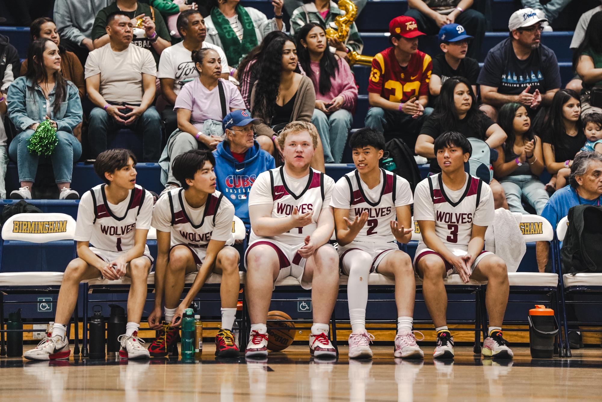  ANTICIPATION  (L to R) Finn Komives, Steven Tu, Eli Taitz, Byron Lim, Jaden Gervacio. 
The starting roster for Van Nuys boys Varsity awaits their introduction onto the finals game court.