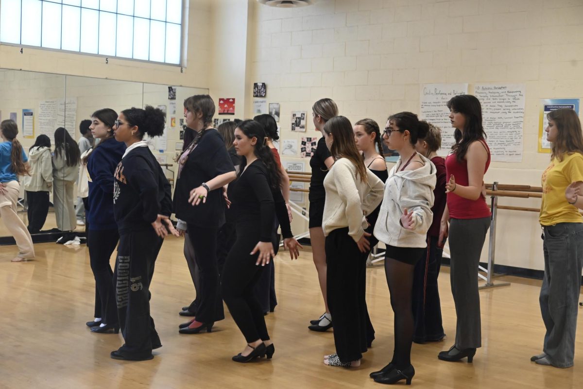  Ready to Tango?  Cast for Chicago's "Cell Block Tango" take to dance rehearsals to sharpen up for the big show at the end of this month. 