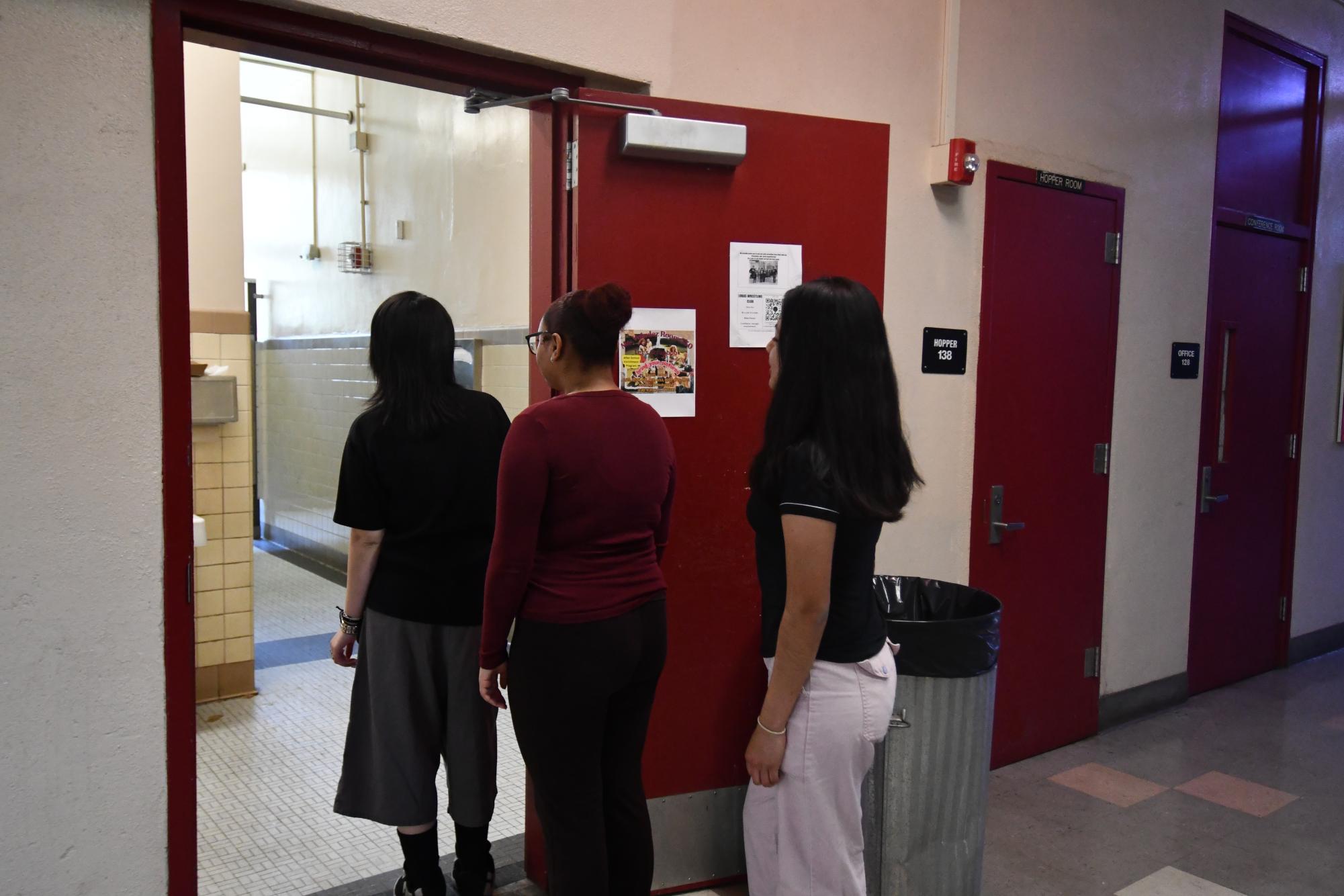  STALLING STALLS  Students line up outside of 100s building restroom. 