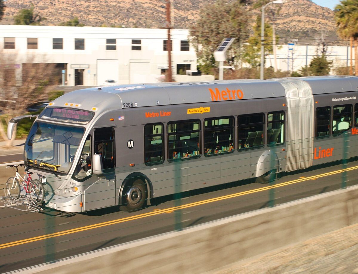 Orange Line bus bound for North Hollywood Station just outside Chatsworth Station shot from an Amtrak Pacific Surfliner train. Wikimedia Commons | Oran Viriyincy