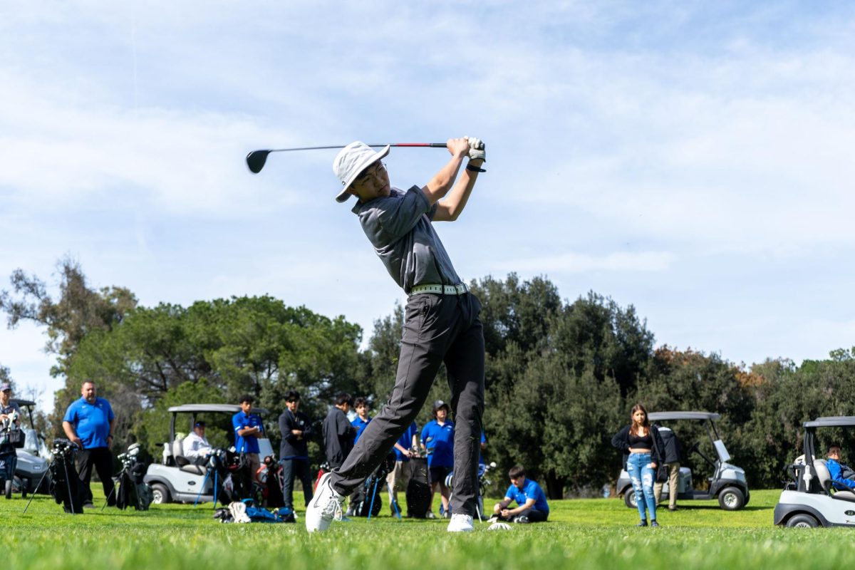 Co-captain Ben Suh drives with an iron. VNHSMIRROR | THOMAS KIM